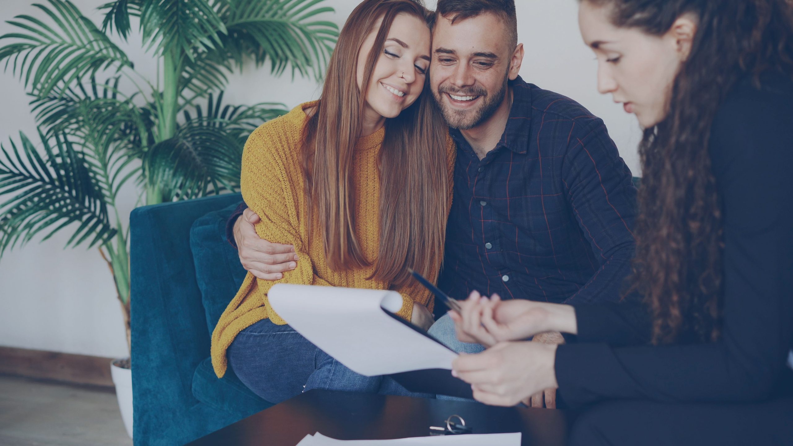 Couple meeting with a life insurance advisor in Utah